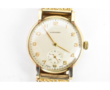 A Longines, manual wind, gents, 9ct gold wristwatch, circa 1950s, having a silvered dial, subsidiary seconds dial, Arabic num