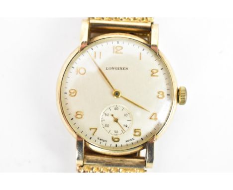 A Longines, manual wind, gents, 9ct gold wristwatch, circa 1950s, having a silvered dial, subsidiary seconds dial, Arabic num