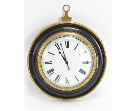 An early 19th century sedan chair clock, having a stepped circular ebonised case with brass surround, 4" white enamel dial wi
