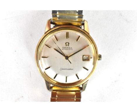An Omega Seamaster, automatic, gents, gold plated wristwatch, having a silvered dial, centre seconds, date aperture at 3, on 