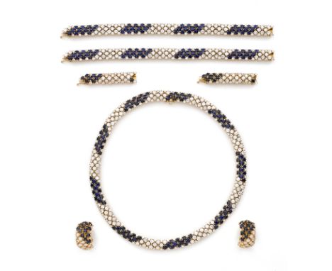 7-tlg. Schmuck-Garnitur m. Brillantenu. Saphiren. 18 kt GG, insg besetzt m. zahlr. Brillanten v. zus. ca. 55 ct (Farbe weiß/ 
