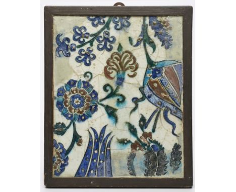 Gr. Platte/ Kachel, Iznik wohl 17. Jh.Heller Scherben, bunt bemalt u. glasiert. Glatte, rechteckige Form m. stilis. Blütenran