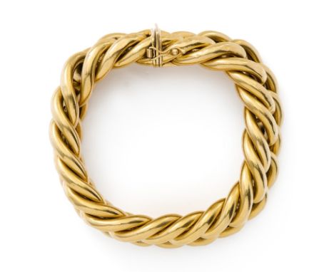 Breites Gold-Panzerarmband.18 kt GG. Breite polierte Rundpanzerglieder. L 21, B 2 cm. Insg. 65,9 g. Oberfläche teils m. Delle