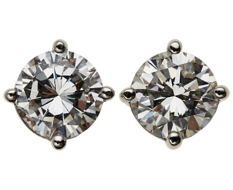Paar Brillant-Ohrstecker.18 kt WG, jew. besetzt m. 1 Brillant v. ca. 1 ct, zus. 2 ct (Farbe tw/ Reinheit vs). Insg. 2,4 g. Or