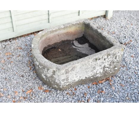 Antique carved sandstone water trough of bow front design, 65cm wide x 73cm deep x 31cm high  