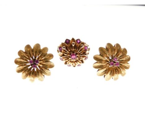 Pair of yellow metal ear studs of flowerhead design with ruby-coloured red stone centres, stamped 9ct, 12g gross approx  