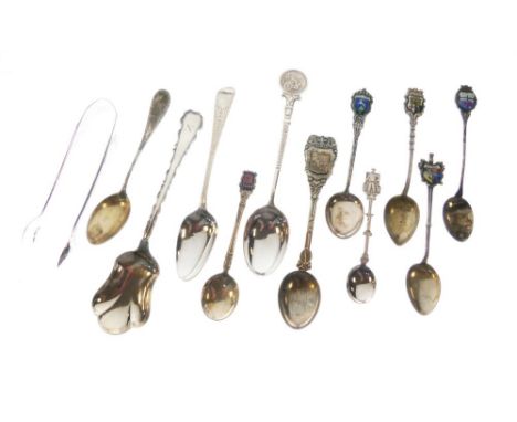 Assorted silver and white metal souvenir spoons, tongs, etc to include; a few enamel-mounted examples, 4.8toz gross approx  