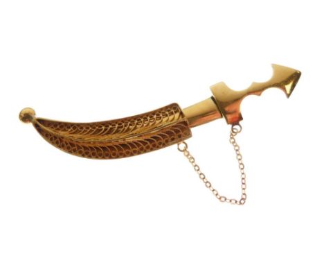 Unmarked yellow metal bar brooch in the form of a Middle Eastern dagger (Jambiya) with filigree sheath enclosing removable bl