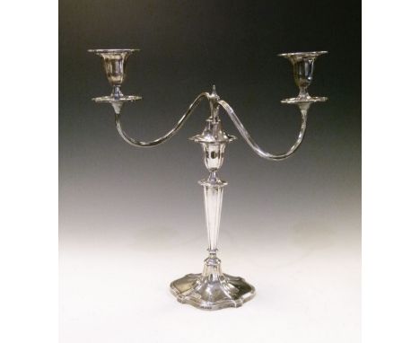 Elizabeth II silver two-branch table candelabrum with serpentine cartouche-shaped nozzles, drop-trays and base, Sheffield 196