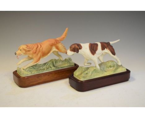 Royal Worcester Series of Sporting Dogs English Pointer figure, together with Golden Retriever, both with wooden bases  