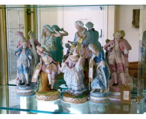 Assorted Continental bisque porcelain figures to include three pairs, largest 32.5cm high (8)  