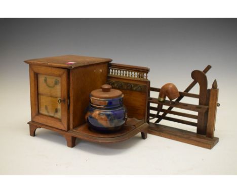 Early 20th Century smokers oak cabinet with ceramic tobacco jar and glazed two-drawer interior, together with a pipe rack in 