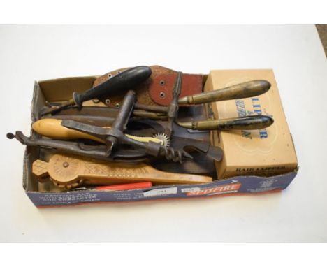 Assorted vintage tools and utensils to include corkscrew, multi-tool, nutcrackers, crimping irons, etc  