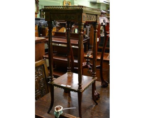 A 19th century French gilt metal mounted marble topped plant stand, with shelf stretcher