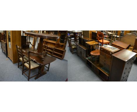 A group of furniture comprising an oak six height chest of drawers; a small side cabinet fitted with four drawers and a pair 