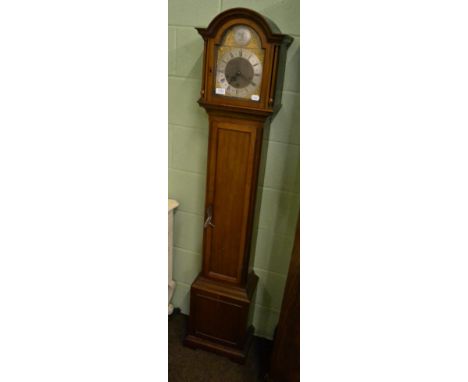 An early 20th century small chiming longcase clock, striking on eight gong rods 