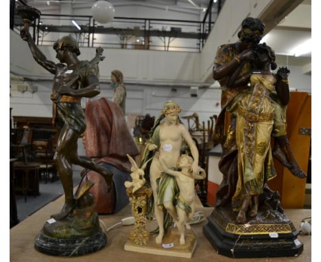 A spelter figural lamp of Victory in the Neo-Classical taste together with a 19th century Austrian bisque figural group after