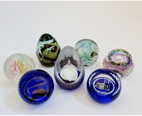 Three limited edition Caithness paperweights together with one Isle of Wight paperweight and two others. BOOK A VIEWING TIME 