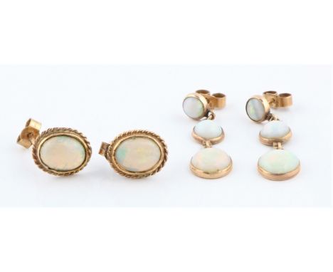 Two pairs of opal earrings, one pair being of dropper design each featuring three round opal cabochons and hallmarked 9ct yel