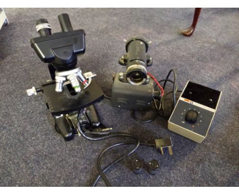 A Coke Troughton &amp; Simms Ltd microscope, together with a projector light. IMPORTANT: Online viewing and bidding only. Col