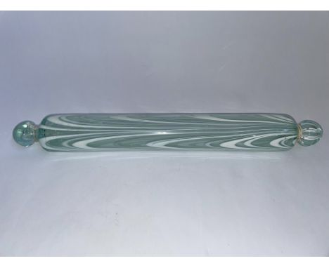 A Nailsea glass rolling pin with a white swirl design. BOOK A VIEWING TIME SLOT ON OUR WEBSITE FOR THIS LOT. IMPORTANT: Onlin