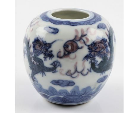 A Chinese Qing Dynasty kangxi six blue character marks to base vase with five-clawed dragon and clouds design, and wooden sta