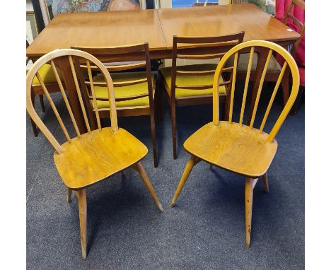 A set of three Ercol stick back dining chairs, one (AF). BOOK A VIEWING TIME SLOT ON OUR WEBSITE FOR THIS LOT. IMPORTANT: Onl