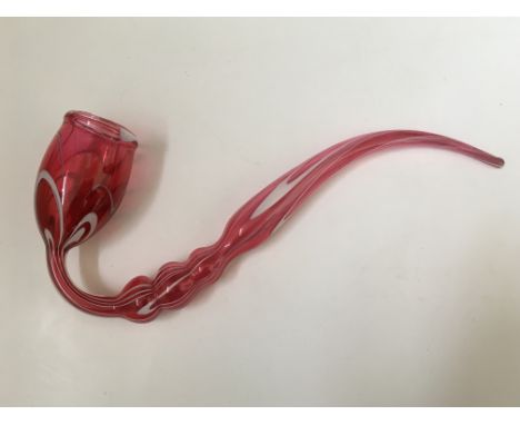 A Nailsea pink glass pipe with white twist design, approx. length 34cm. BOOK A VIEWING TIME SLOT ON OUR WEBSITE FOR THIS LOT.
