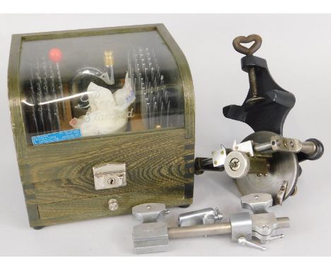 A Precista Standard watch maker's drill set, a bench mounted Austrian patented watch maker's tool etc.