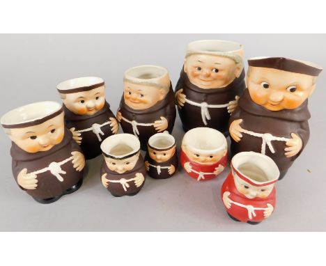 Various Hummel monk shaped jugs, to include a red example and various Goebel ceramic monk jugs, and a red egg cup.