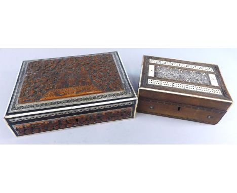 Two 19thC Indian boxes, one example with a carved lid, the other a cribbage box, 21cm and 16cm wide.