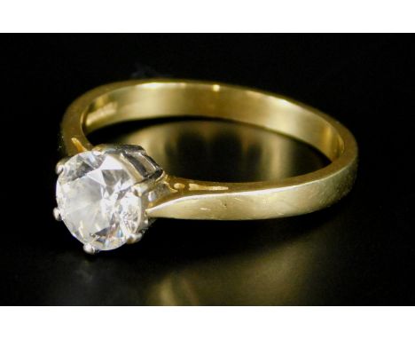 A gold dress ring, set with central CZ stone, stamped .585, 3g all in. 