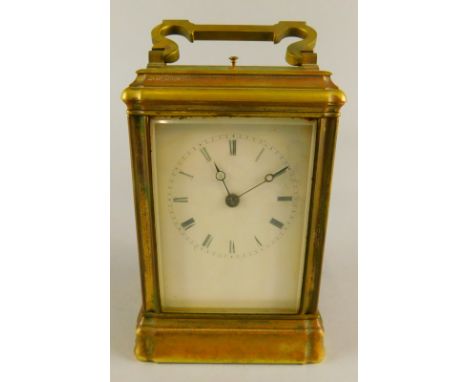 A late 19thC French brass carriage clock, in corniche shaped case with bevelled glass, the enamel dial with Roman numerals, w