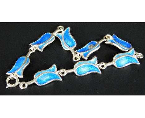 A Canwick silver and enamel bracelet, in the form of flowers, set with blue enamel, (AF), makers mark C.J.L, 12.1g all in. 