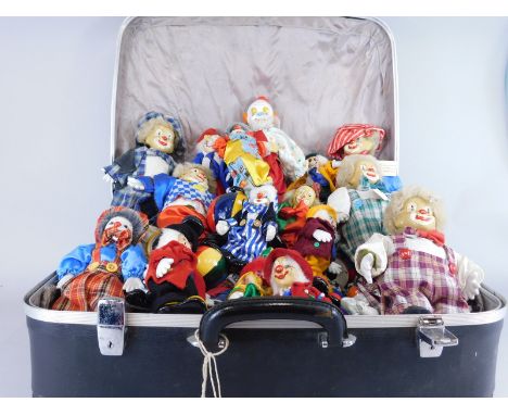 A large quantity of ceramic and other clown models or toys.