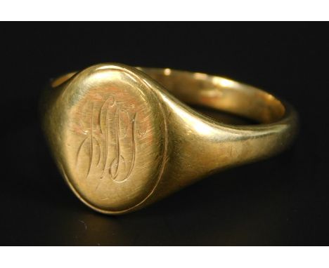 A 9ct gold signet ring, bearing rubbed initials to crest, 5.9g.