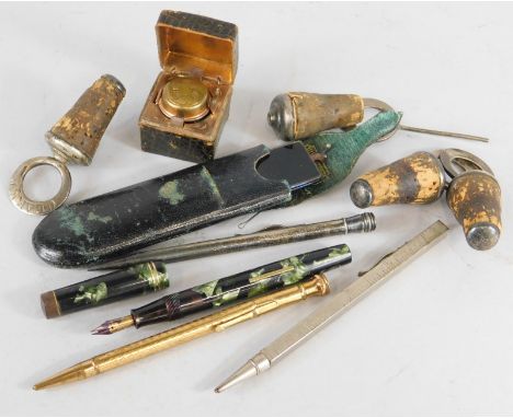 A collection of items, to include four silver mounted decanter stoppers, an unusual pair of spectacles with hinged lenses, pe