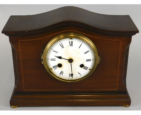 An Edwardian mahogany and chequer banded mantel clock, with French enamel dial, on bun feet, 35cm wide