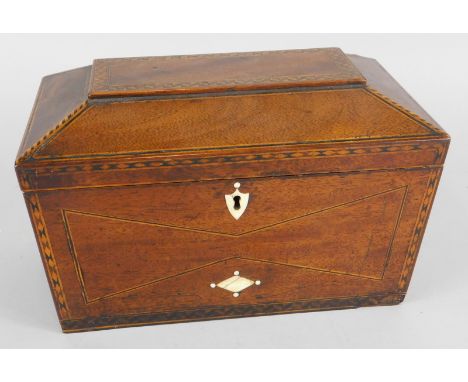 A 19thC mahogany and parquetry tea caddy, the hinged lid enclosing two lidded divisions, the front with bone escutcheon and l