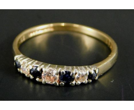 A 9ct gold dress ring, set with blue and CZ stones, 1.5g all in. 