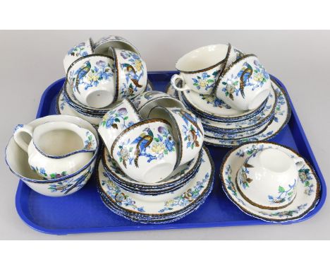 A Woods ware Mayfair pattern part tea service, decorated with Asiatic pheasants, etc. 