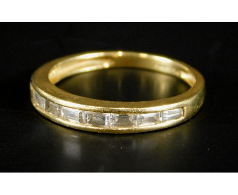 A 14ct gold dress ring, set with baguette cut tiny diamonds, 2.1g all in. 