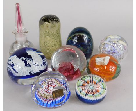 A collection of paperweights, to include two millefiori examples, an inkwell etc