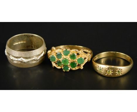 Three dress rings, to include two 9ct gold stone set rings, 4g all in, and a silver dress ring (3). 