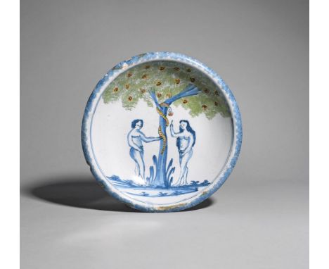 A Bristol delftware Adam and Eve charger  c.1750, probably Richard Frank, Redcliff Back, depicting the Temptation in the Gard