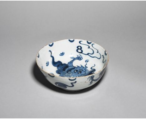 A rare delftware bowl  c.1760, boldly painted in blue with the Dragon pattern, the large beast depicted to the well, with his
