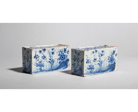 A pair of delftware flower bricks  c.1740-50, the rectangular forms painted in blue with bamboo and flowering Oriental plants