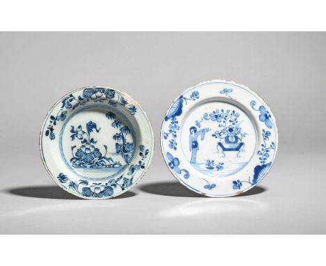 Two small delftware plates  c.1740-60, one painted in blue with a standing Chinese figure pointing towards a vase of flowers 