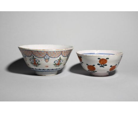 A delftware punch bowl  c.1725-40, probably Bristol, the tall flared sides painted in red, blue and green with stylized flowe