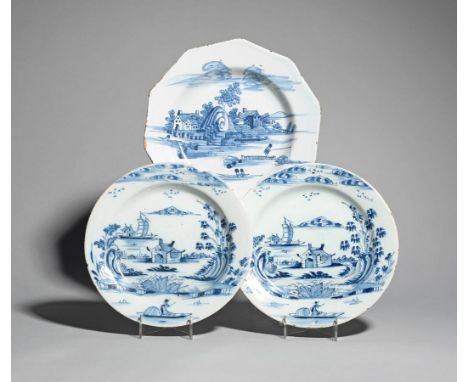 A pair of Bristol delftware plates  mid 18th century, painted in blue with a figure in a boat before a low hut on an island, 